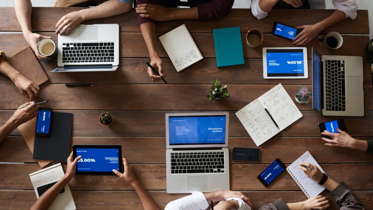 teamwork-table-laptops Help Steer the Future of WordPress via the FSE Outreach Program design tips 